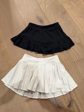 all in motion Black Ruffle & White Pleated Girls' Skorts Duo